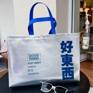 Premium Holographic Non Woven Packaging Bag Custom Size & Logo Printing on Polypropylene Tote Ideal for Retail and Gift Use