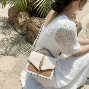 Cross border Niche Design Messenger Small Square Women’s Bag High end PU Texture All match Fashion Color Contrast Hand carrying