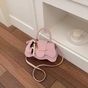 Designer Summer PU Lady Crossbody Shoulder Saddle Bag Simple Trendy Flap Closure Women’s Handbags with Pendant